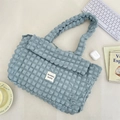 Close-up of light blue bubble textured canvas tote bag with soft ruffled fabric detail - Bubble Blue