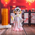Detailed close-up of a Q-version girl figurine in pink Hanfu with traditional screen backdrop - Large Size Holding Book