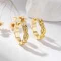 Elegant gold braided hoop earrings featuring a unique hollow woven texture for women - Gold
