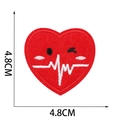 Macro detail of heart-shaped embroidery patch with ECG line and 4.8cm size markings - ECG Heart (9号)