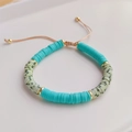 Bracelet bohème multicouche avec perles Heishi turquoise et accents dorés élégants - Perles Heishi Vert Turquoise Tissées (RTS220002G)