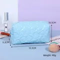 Y2K style light blue heart embossed makeup bag with dimensions 19.5x10.5x9.2cm - Pillow Shape / Blue