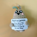 Handmade crochet positive potato doll in brown yarn with an encouraging message card - Blushing Potato with Card