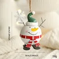 Hand-painted snowman metal Christmas ornament with green hat and white snowflake decor - White Fat Snowman Hanging Ornament