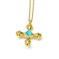 Detail of 18k gold cross pendant with an inlaid blue natural stone on a thin chain - Gold Light Blue Cat Eye Stone