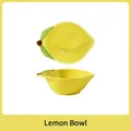 Ceramic lemon shaped hamster food bowl with vibrant yellow finish and leaf detail - Lemon Small Bowl