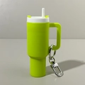 Lime green silicone tumbler keychain with white lid, straw and metal carabiner clip - Fluorescent Green