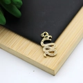Gold snake pendant with micro-pave crystal zircons and green gemstone eyes for jewelry DIY - Snake Rhinestone Green Eyes Accessory