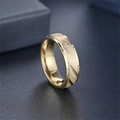 Detailed view of gold-tone titanium steel ring with frosted finish and diagonal grooves - Size 6 / Gold