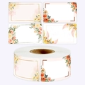Macro detail of floral adhesive labels for kitchen storage and gift marking on a roll - Yellow & Pink Floral Style (F-74)