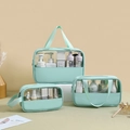 Three mint green PVC and PU makeup bags in different sizes with transparent windows - Small, Medium And Large Bag Set / Green