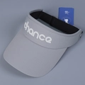 Detail of light gray sun visor with UPF 50 tag and chance text embroidery - M(56-58cm) / Gray