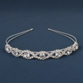 Detail of silver wavy tiara headband with sparkling rhinestones on blue background - Round Rhombus Rhinestone Wave Style (DFK998 Clear Rhinestone)