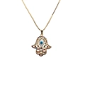 Macro view of gold Hamsa Hand pendant with colorful evil eye zircon inlays and box chain - Gold Hamsa Hand Evil Eye