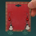 Christmas earrings featuring red bells, white snowmen, and green glitter snowflakes - Snowman Bell Snowflake (H-148)