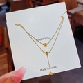 Elegant gold-plated double-layer snake chain necklace featuring polished beads - Gold