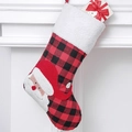 Classic buffalo plaid Christmas stocking with a plush Santa Claus patch and white cuff - Santa Claus