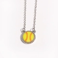 Macro view of the yellow baseball pendant with red stitching and silver metal chain - Softball / White Gold