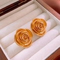 Detailed close-up of golden matte rose earrings placed in a luxury jewelry box padding - 3# Gold Rose