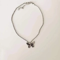 Silver snake chain necklace featuring a vintage butterfly pendant on a clean white background - Single Layer Silver Butterfly