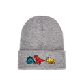 Close-up of grey knitted beanie featuring colorful cartoon dinosaur embroidery details - Kids (50-53cm) / Heather Grey