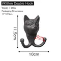Vintage cast iron cat head wall hook with dual hooks and rustic black metal finish - 8412 Cat Head Double Hook