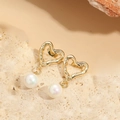 Vintage hollow gold heart earrings featuring large lustrous white shell pearl drops - Hollow Heart Pearl