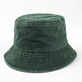 Detail of dark green washed cotton bucket hat with metal eyelets and stitched brim - M (56-58cm) / Dark Green