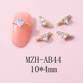Macro detail of heart shaped nail charm with golden wings and rhinestone, size 10x4mm - Gold White Moonlight Style (AB44) / 10 Pieces Pack