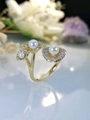 Macro detail of gold lotus leaf ring featuring white pearls and zircon pavé setting - Adjustable Open / KC Gold