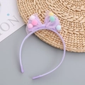 Light purple girls' headband with mesh bow and colorful pom-poms on a woven mat - Purple Headband / Purple