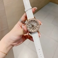 Orologio elegante in pelle bianca con cassa oro rosa e quadrante a fiore rotante in cristallo - Cinturino Bianco Quadrante Rotante
