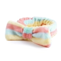 Detailweergave van zachte regenboog gestreepte pluche hoofdband met grote koraalvlies strik - Stijl 31