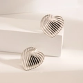 Exaggerated silver heart stud earrings with vertical textured stripes in 18K steel - Heart Stripe / Steel