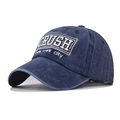 Close-up of CRUSH letter embroidery on washed navy blue vintage denim baseball cap - Adjustable / Washed Navy Blue