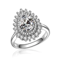 Dettaglio dell'anello con zircone a goccia, doppia aureola e finitura in argento lucido - US 7 / Oro Bianco