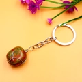Natural red and green stone keychain with wire-wrapped crystal on a copper ring - Unakite