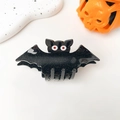Dettaglio della pinza per capelli a pipistrello di Halloween con glitter neri e occhi rossi - Pipistrello glitterato di Halloween - 9 cm nero
