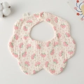 Detail of floral cotton muslin baby bib with petal shape and soft breathable texture - Gauze Flower Band - Pink Roses