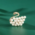 Elegant swan brooch featuring golden metal and white pearls for women outfits - Xd825279