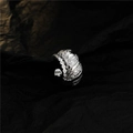 Macro shot of S925 sterling silver wide band ear cuff with shimmering zircon pavé stones - Copper / White Gold (Single)