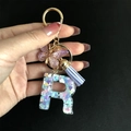 Resin initial R keychain with colorful heart sequins, purple butterfly and tassel - Letter R / Butterfly Tassel 8-Shape Buckle