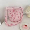 Borsa a spalla in peluche rosa con motivi a cuore e un'ampia tracolla in morbida eco-pelliccia - Cuore Piccolo Rosa Chiaro