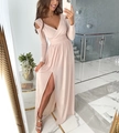 Detailed close-up of pale pink long-sleeve dress with elegant high-slit hem and silk-like fabric - S / Bottoms / Pink