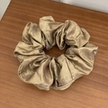 Lustrous gold metallic silk scrunchie with pleated texture on a wooden surface - Large / Light Coffee
