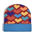 Vue détaillée du motif de cœur arc-en-ciel et de la texture en maille du bonnet - Cœur Coloré