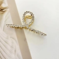 Elegant gold metal hair claw clip with twisted design and sparkling rhinestones - Twisted Cross Style (F-006)