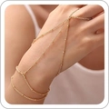Bracciale schiava dorato minimalista con design multi-catena e anello a cuore - Piccole perle di riso a tre strati dorate
