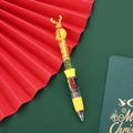 Christmas multi-color ballpoint pen with yellow reindeer topper and golden liquid sequins - Series 6 - Yellow Snowman