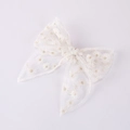 Detail of embroidered daisy pattern on white lace bow hair clip for girls - White